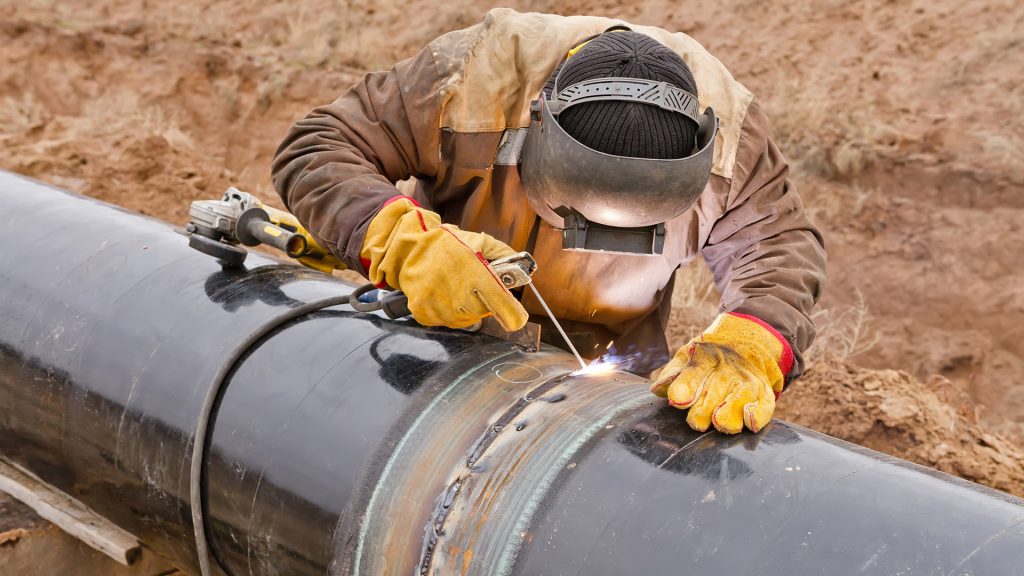 Pipeline construction with welder