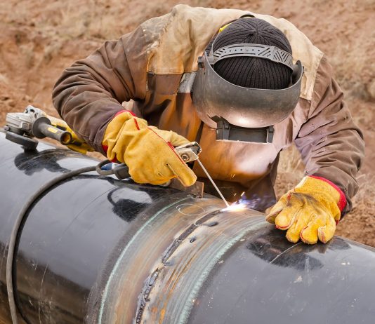 Pipeline construction with welder