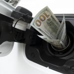 Money going into gas tank