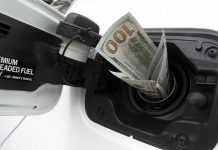 Money going into gas tank