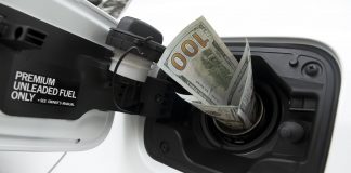 Money going into gas tank