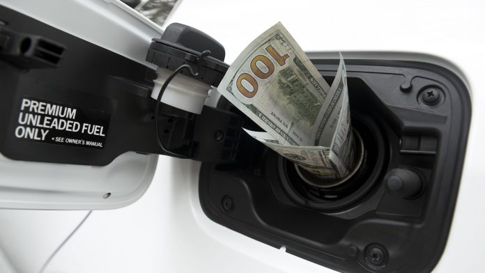 Money going into gas tank