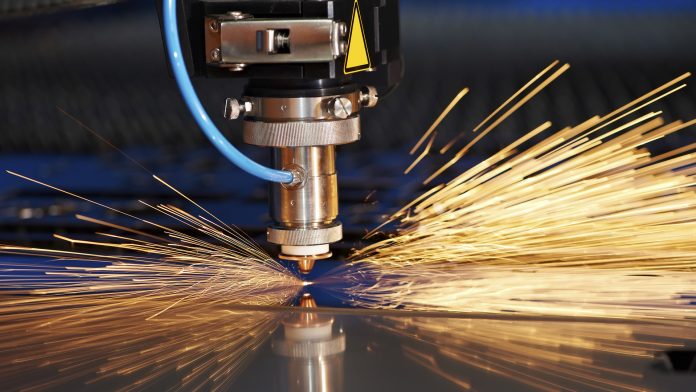 Laser cutting of metal sheet in tool shop