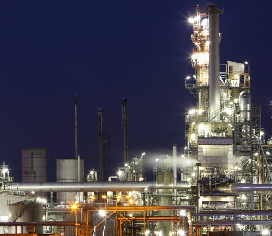 Chemical manufacturing plant at night