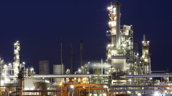 Chemical manufacturing plant at night