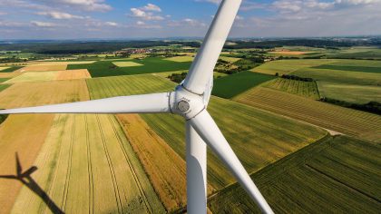 Wind turbine in farm field