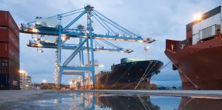 Port cranes loading ship