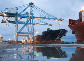 Port cranes loading ship