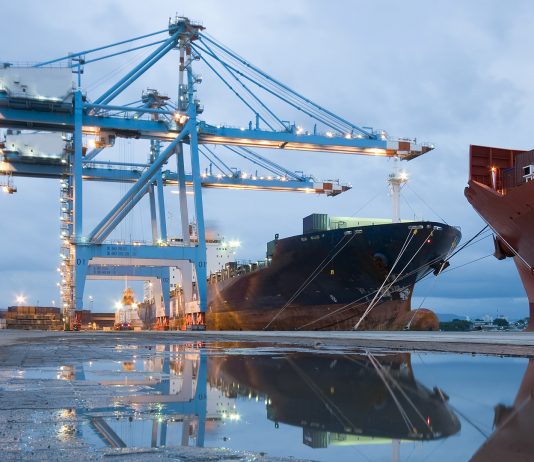 Port cranes loading ship