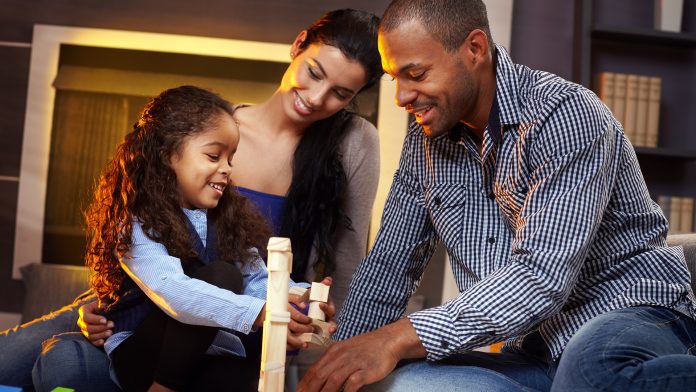 Parents and child building blocks