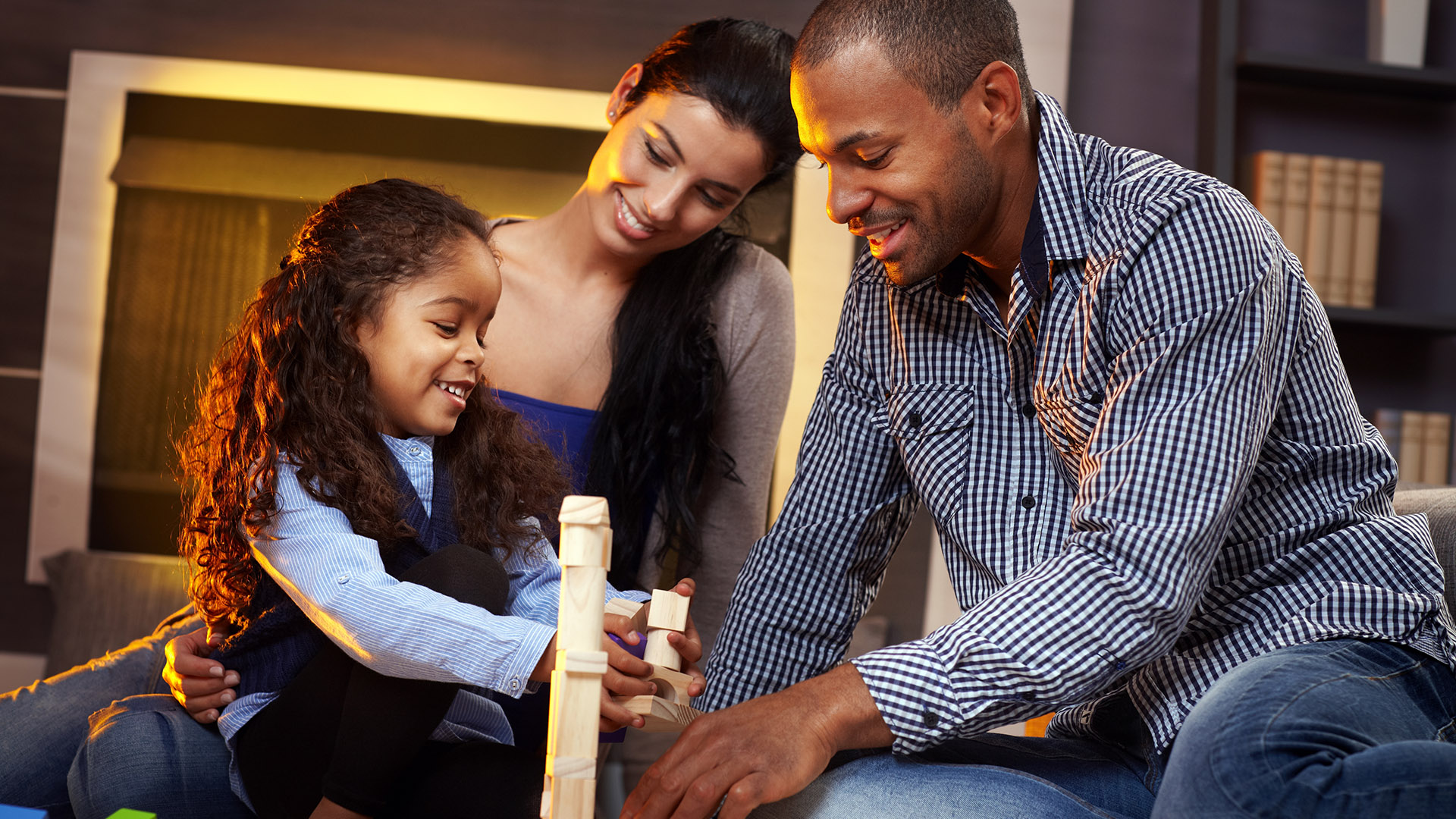 Parents and child building blocks