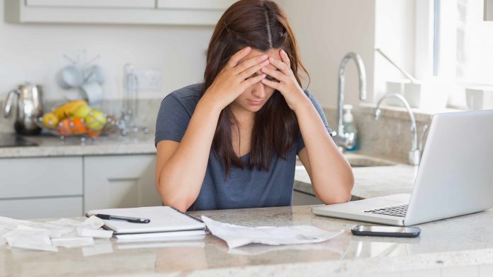 Woman stressed over bills