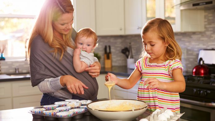 Mom cooking with children