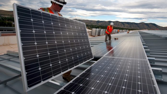 Large solar panel installation on rooftop