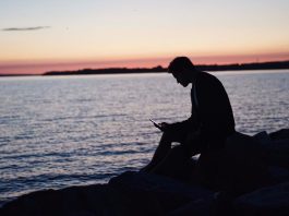 Sitting on the beach during sunset