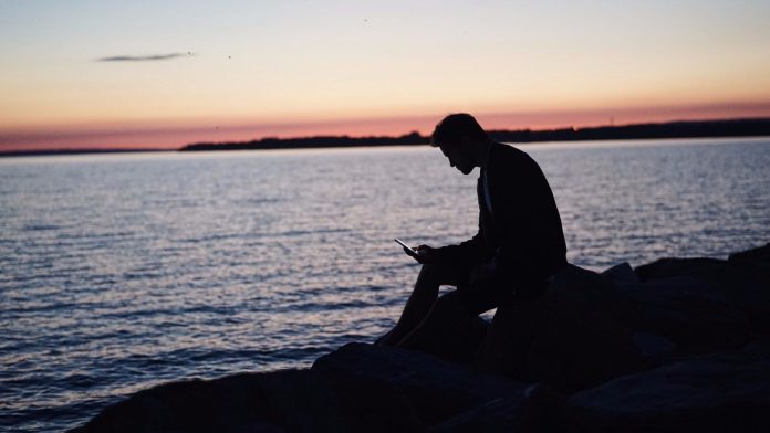 Sitting on the beach during sunset