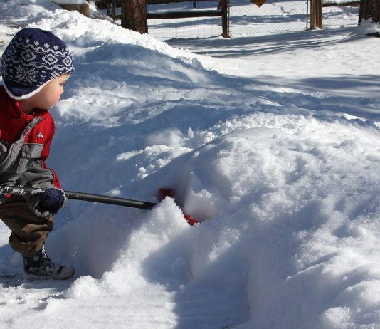 Child Shoveling Snow