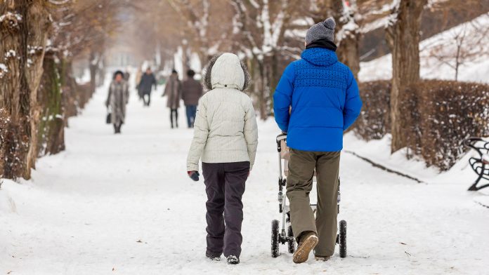 Family Walking in the Winter Snow