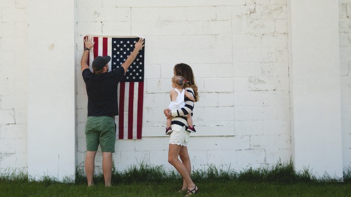 Man holding American flag