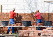 Bricklayers are building as a team