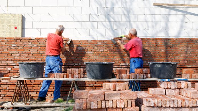 Bricklayers are building as a team