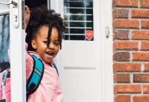 Child leaving house for school