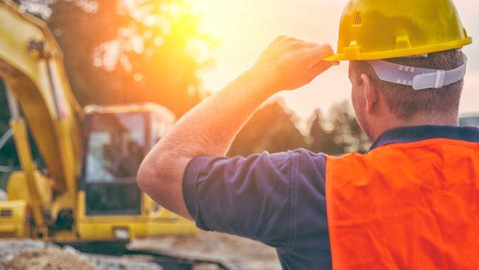 Construction Worker with Excavator