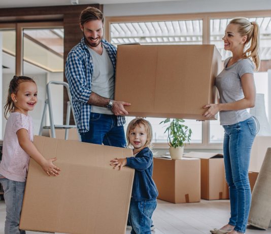 Young family moving into a new house