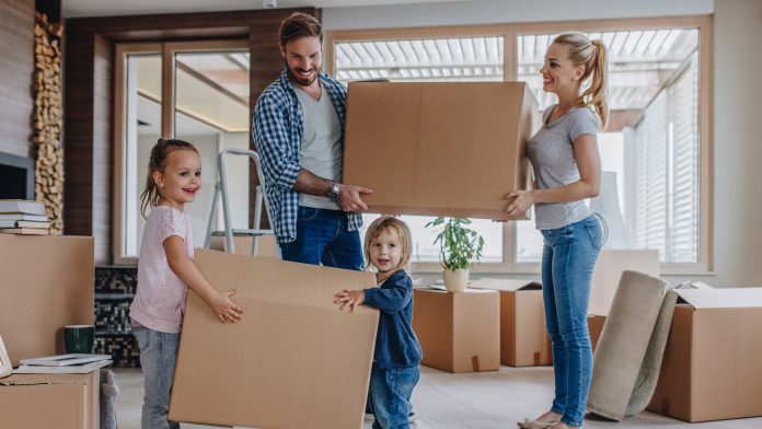 Young family moving into a new house