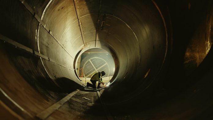 Welder Inside of Pipeline