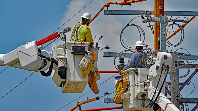 Linemen Working on Transformer