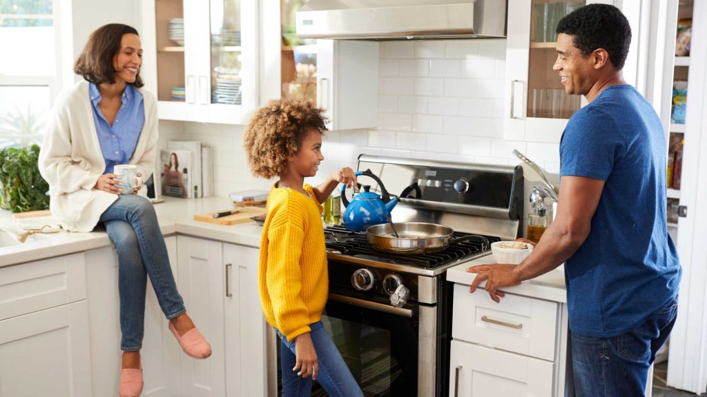 Family Preparing Food on Natural Gas Stove