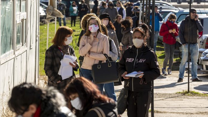 People in Line During Pandemic