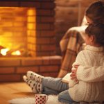 Mother and Child By Fireplace
