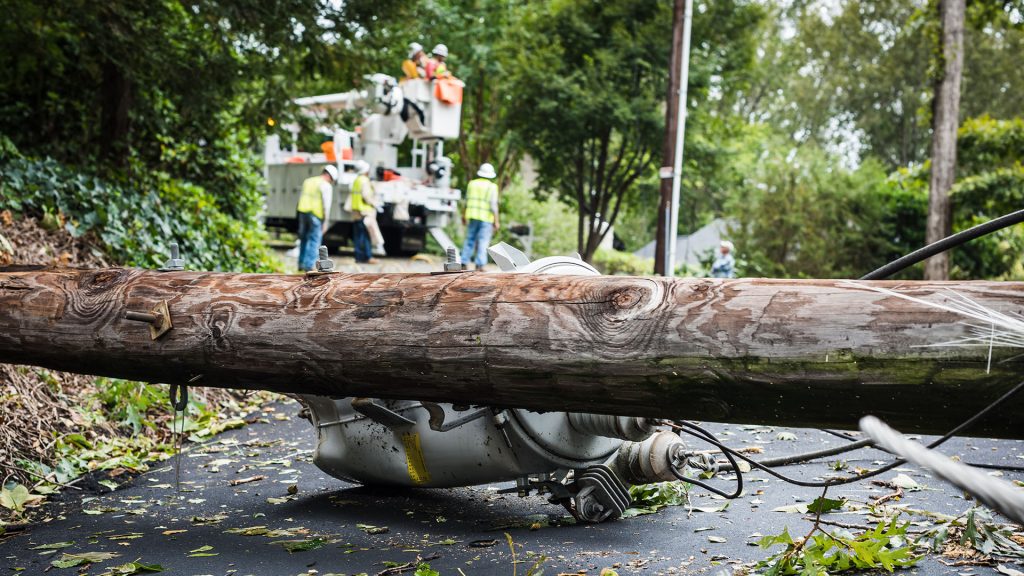 Down power lines and electric equipment in residential neighborhood