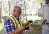 Man performing home energy audit