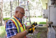 Man performing home energy audit