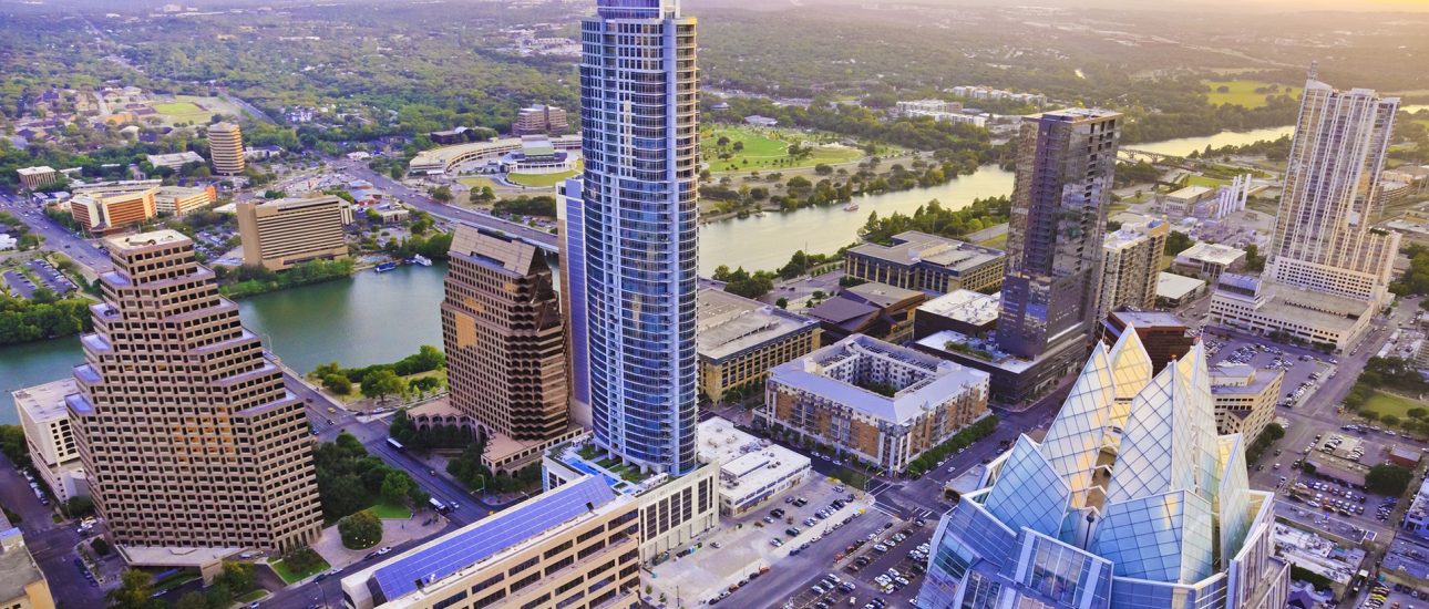 Austin Texas skyscrapers skyline aerial at sunset from helicopter