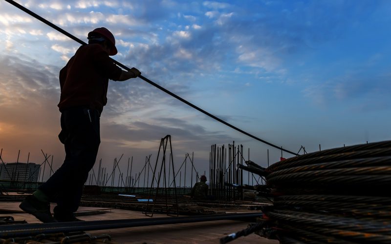 Construction worker with rebar