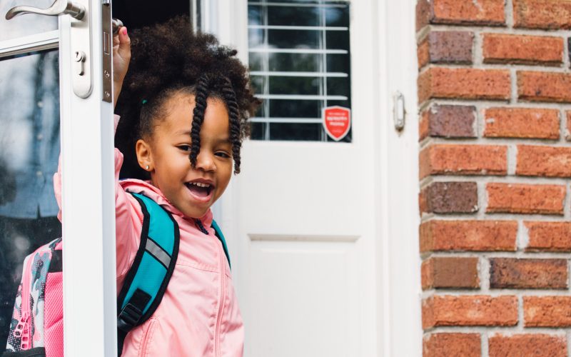 Child leaving house for school