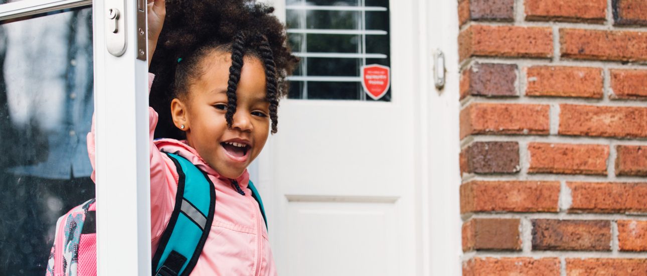 Child leaving house for school