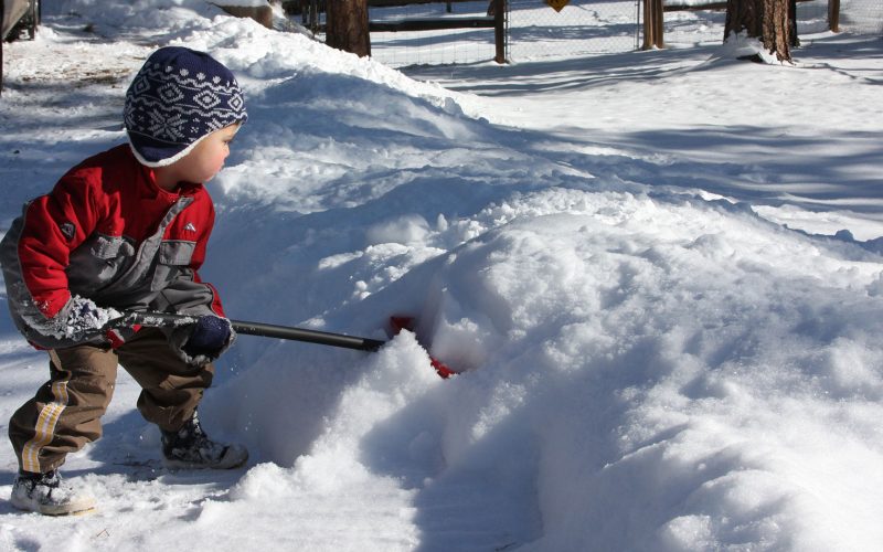 Child Shoveling Snow