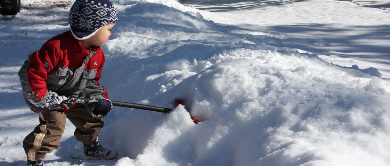 Child Shoveling Snow