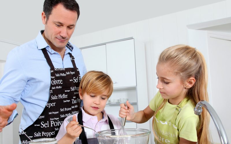 Dad cooking with children