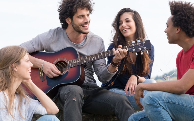 Group of friends with guitar