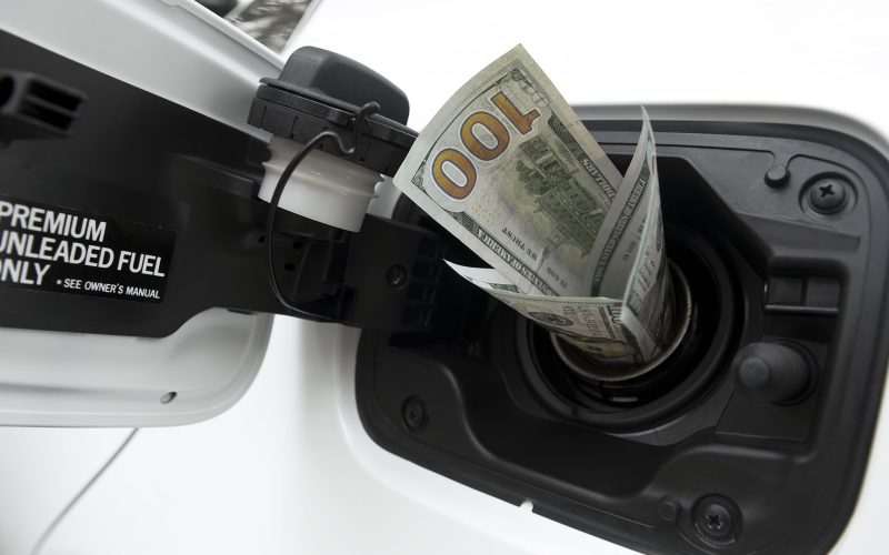 Money going into gas tank