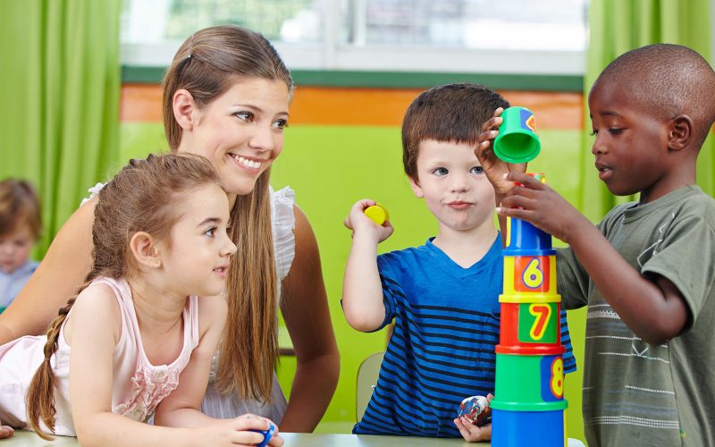 Kindergarten teacher with students