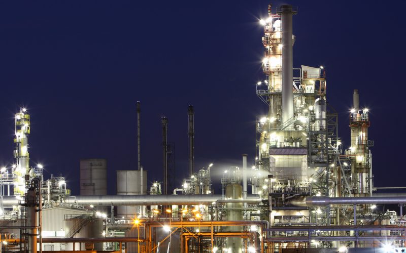 Chemical manufacturing plant at night