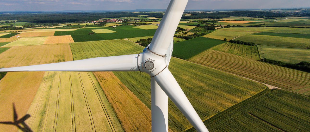 Wind turbine in farm field