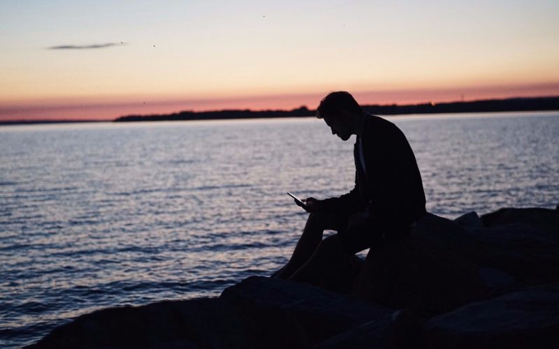 Sitting on the beach during sunset